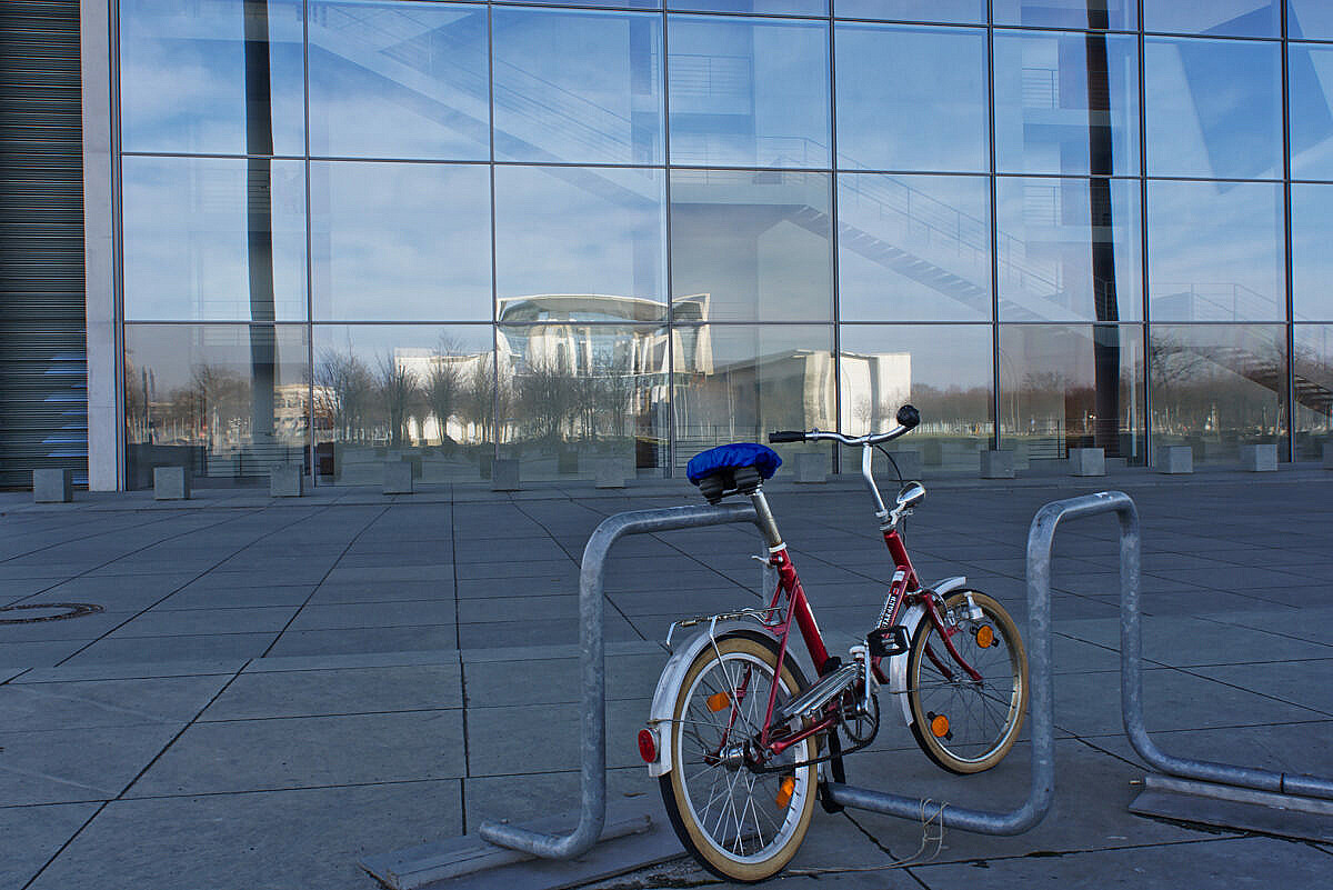 Bicycle parked in front of the Bundestag in Berlin