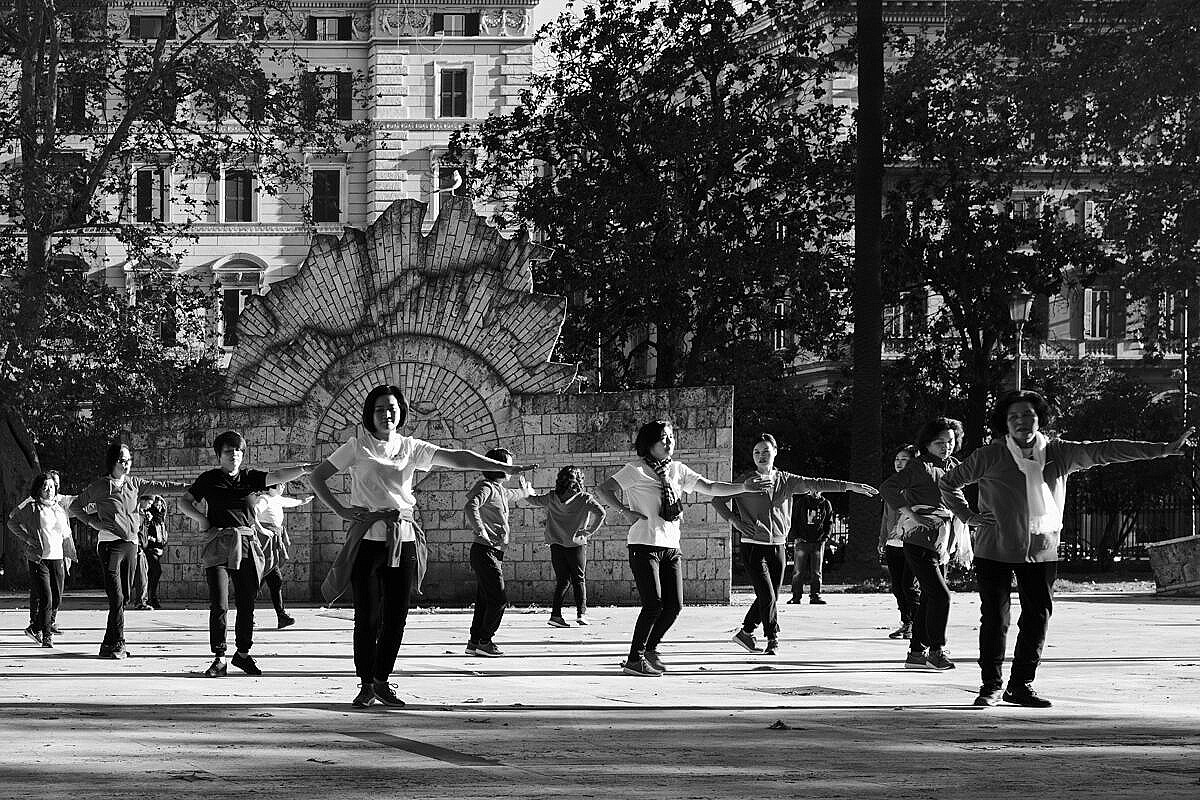 Group of women excercising in a park on the Esquiline Hill in Rome