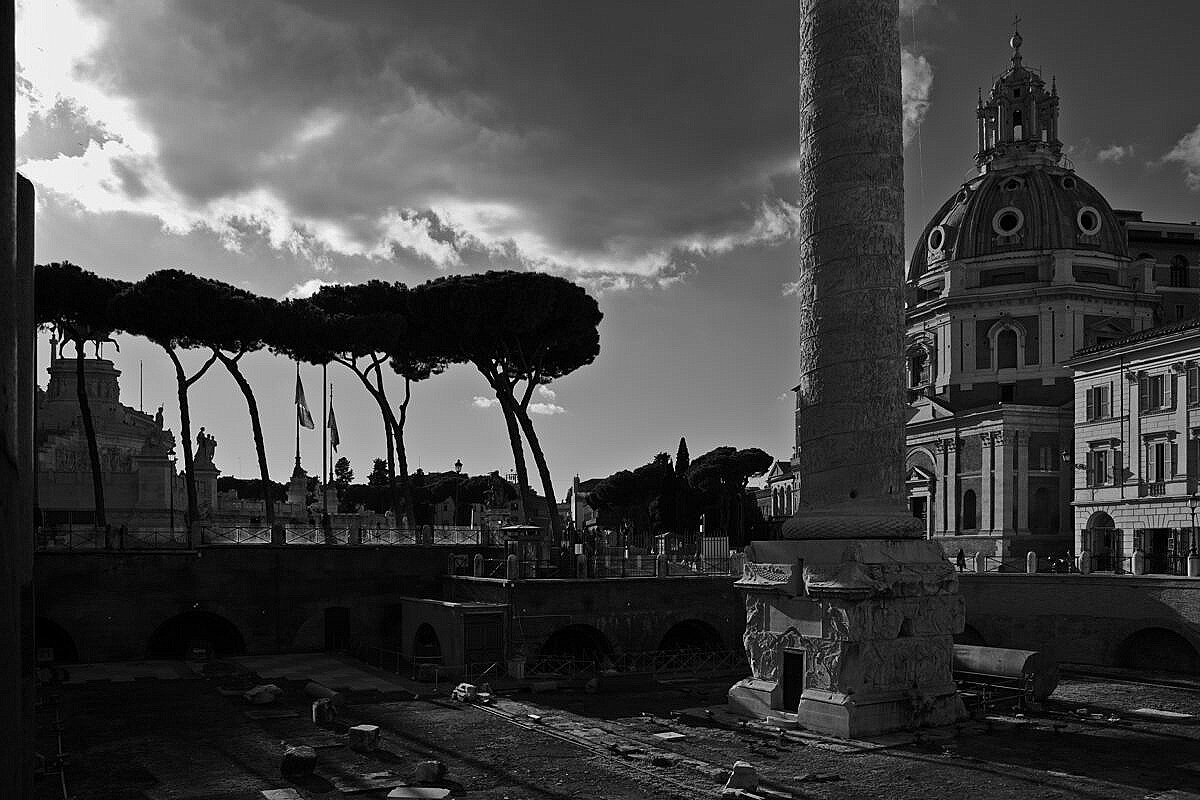 The Forum of Hadrian in Rome with the Column of Hadrian on a sunny day.