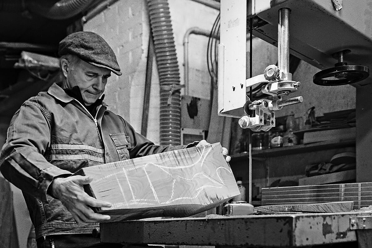 Oar maker (remer) Saverio Pastor contemplates a block of wood for a forcola. This is the hardest part of making a Venetian oarlock.