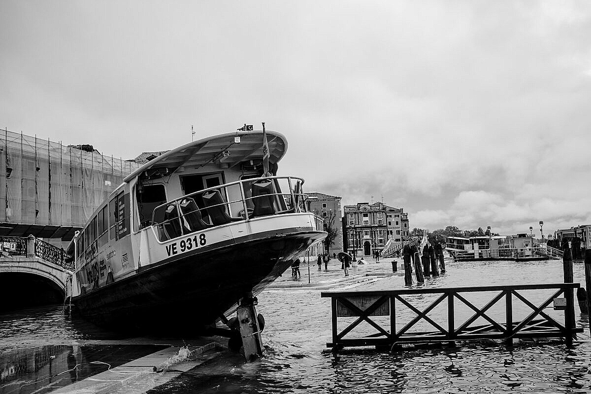 High tide - Venice under water - wrecked vaporetto
